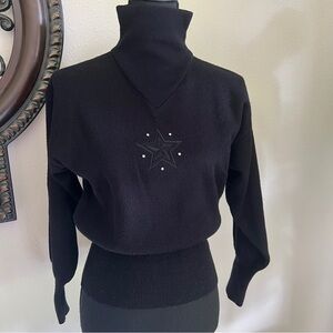 Tyrolia Skiwear is by HEAD Women’s Black Ski Sweater Jumper Silver Star